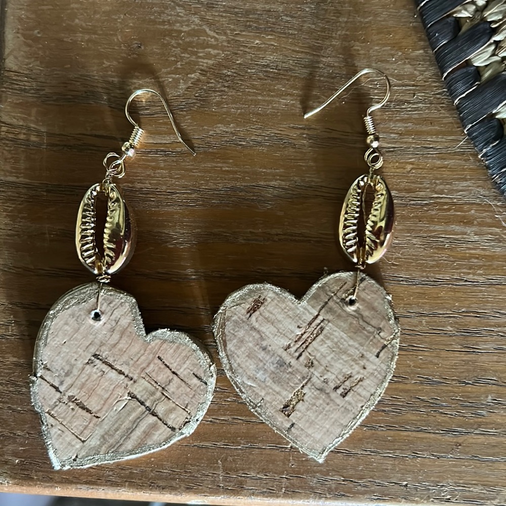 Heart shaped wood and cork cowrie shell pierced earrings. Handcrafted.